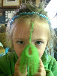 Girl Twin learns the hard way a Koosh Ball sticks in long hair"